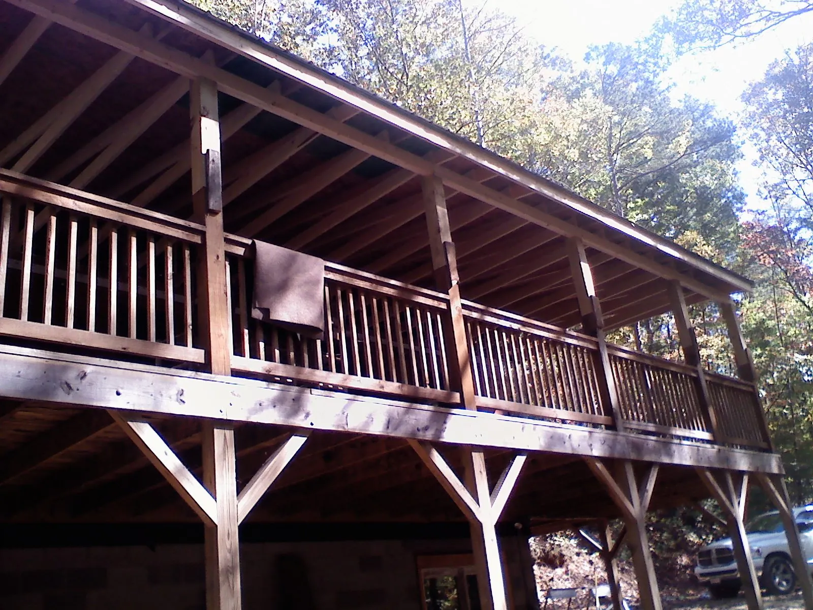 Timber framing under a new elevated porch and deck — Roof Leak Repair in Stilwell by Roofing Brothers